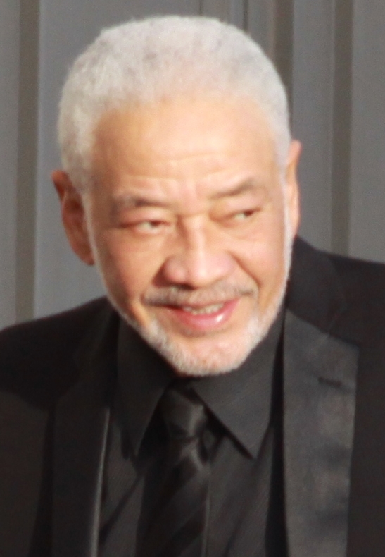 Bill Withers smiling at the Rock and Roll Hall of Fame induction ceremony in 2015.
