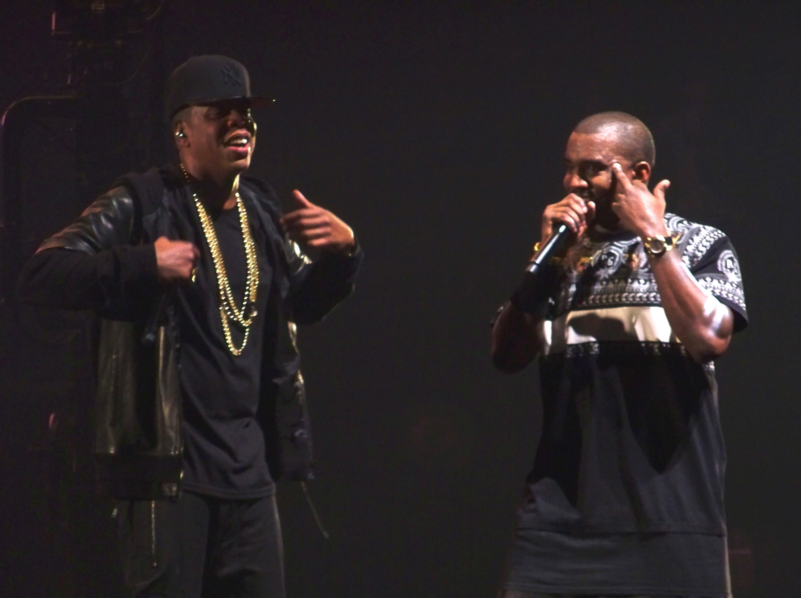 Jay-Z, left, and Ye perform together onstage during the Watch the Throne Tour in Los Angeles in 2011.