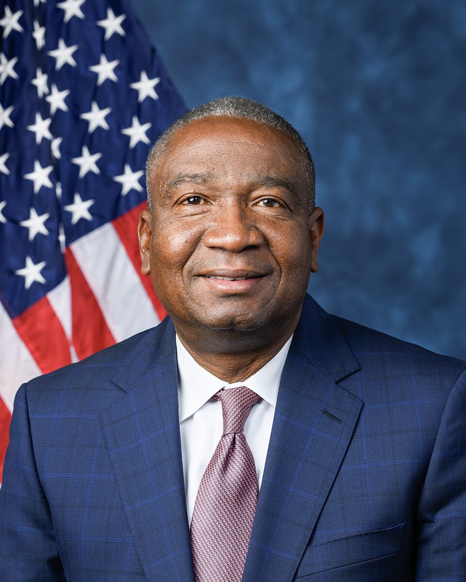 Official portrait of Louisiana Congressman Cleo Fields in a dark suit in front of an American flag.